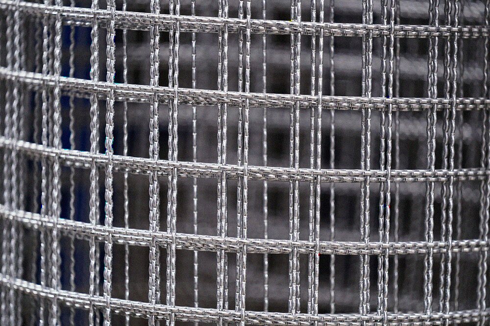 A roll of welded galvanized wire mesh of the kind used to close rodent entry points